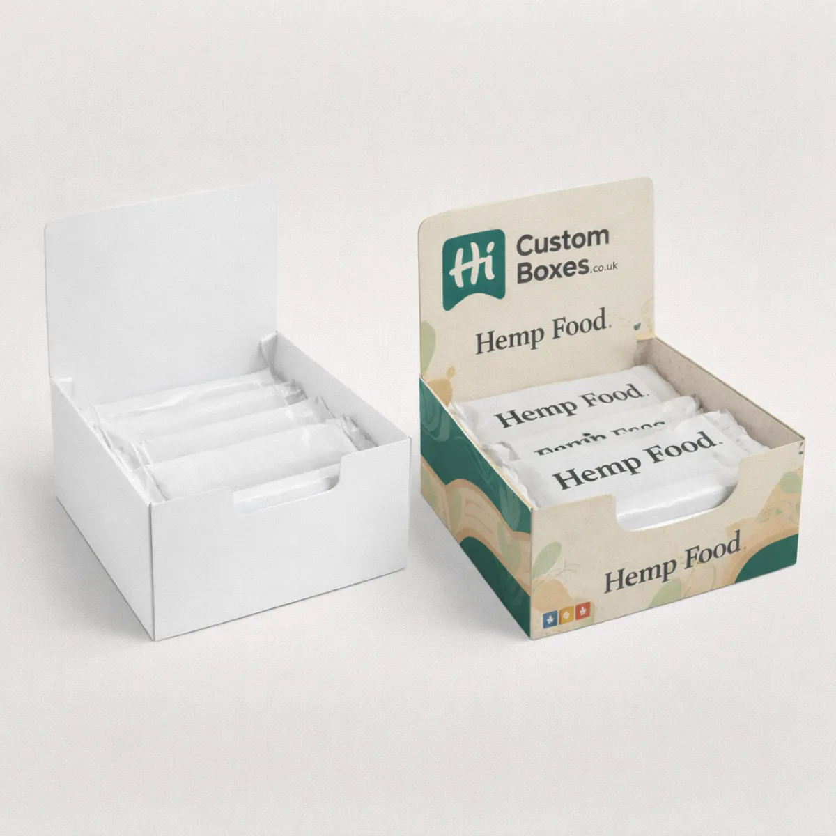 Counter display boxes containing packaged hemp bars- featuring one plain white and one with colourful botanical patterns- class=